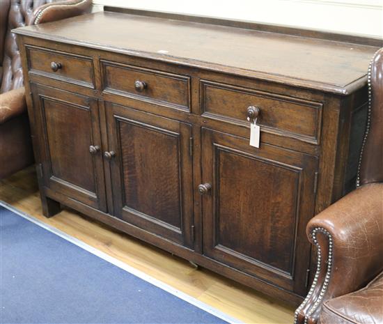 An 18th century style oak dresser base, W.152cm